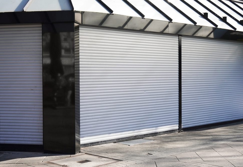 store front with roller shutters